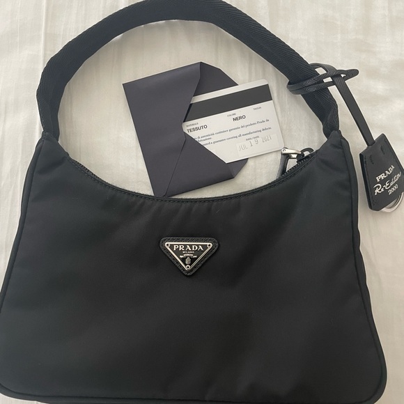 Prada Handbags - Prada Re-Edition 2005 Re-Nylon mini bag. Nero color